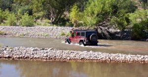 A Jeep Wrangler crossing the Upper Salt River in Arizona.